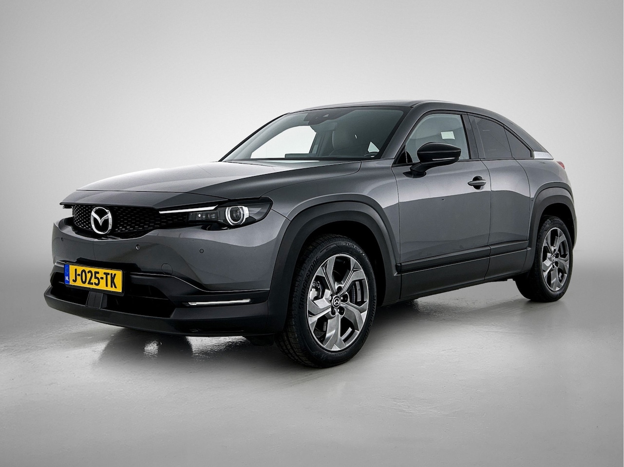 Mazda MX-30 - e-SkyActiv 145 First Edition 36 kWh Elec. stoelen / Navigatie / Adaptieve cruise - AutoWereld.nl