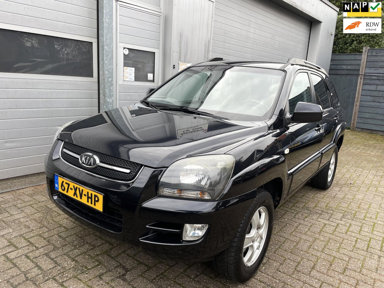 Kia Sportage - 2.0 CVVT 2007-Airco-Cruise-Velgen-New APK - AutoWereld.nl