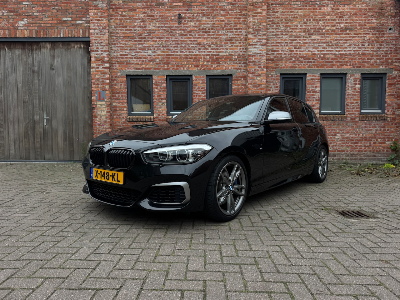 BMW 1-serie - M140i High Executive 5-drs, Rwd, Leer, Shadow Line, LCI2 - AutoWereld.nl