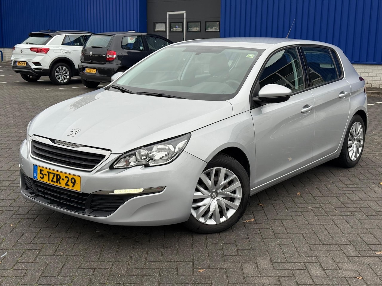 Peugeot 308 - 1.6 BlueHDi Blue Lease/Clima/Cruise/Navi/NAP/Trekhaak - AutoWereld.nl