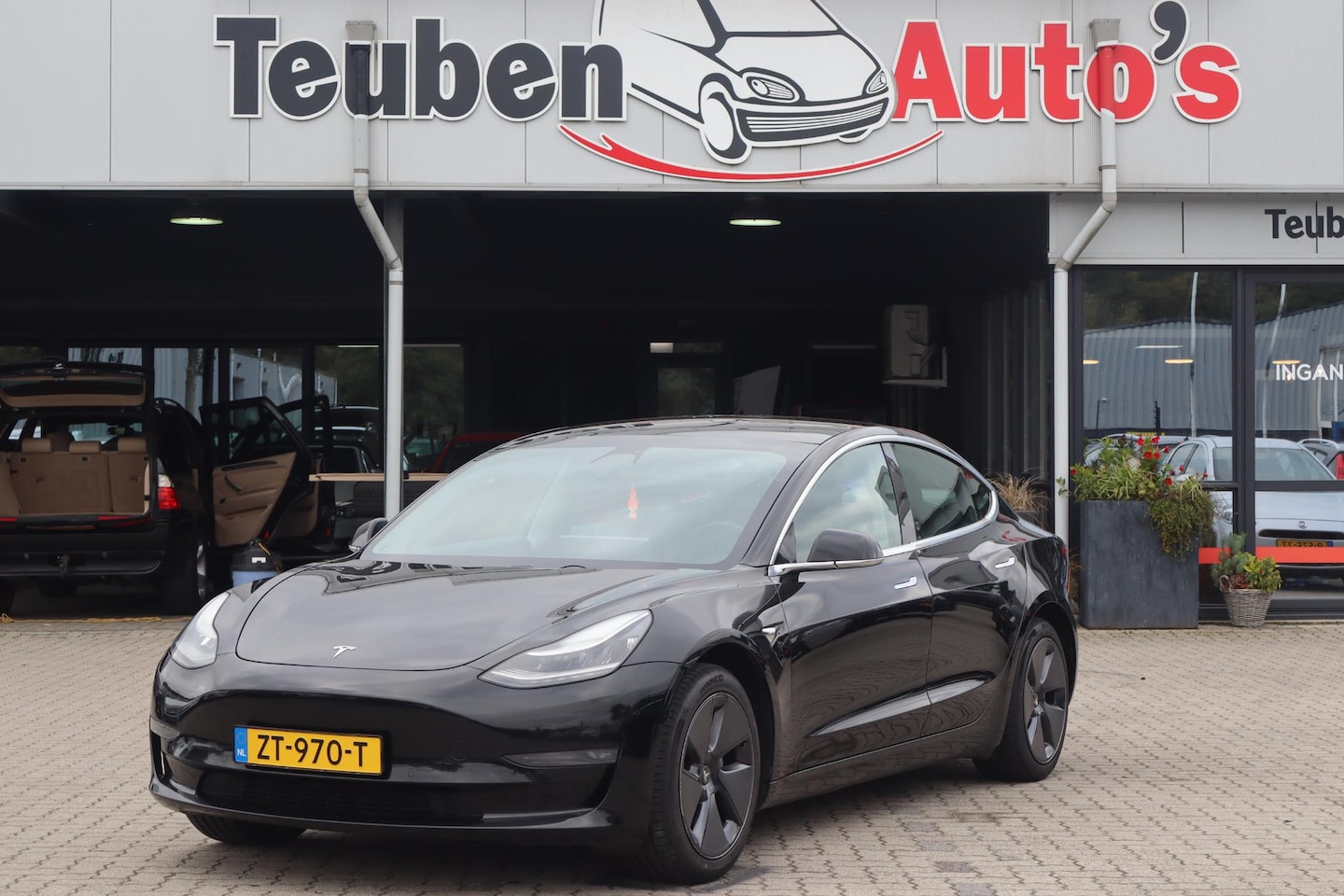 Tesla Model 3 - Standard RWD Plus 60 kWh 80% SOH, Panoramadak, Lederen interieur, 360 Camera - AutoWereld.nl