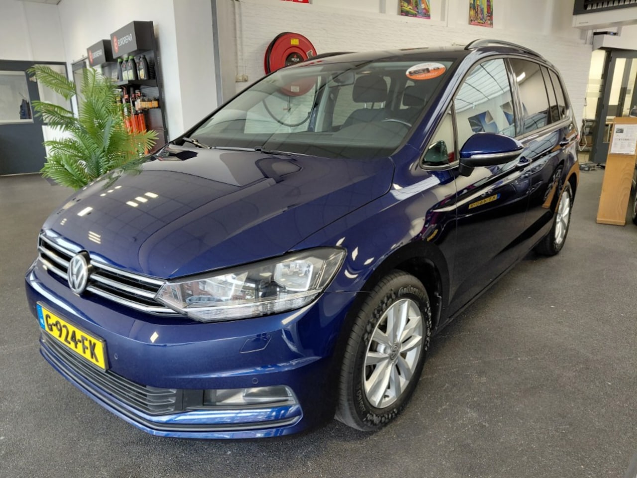 Volkswagen Touran - 1.2 TSI Highline 1.2 TSI Highline - AutoWereld.nl
