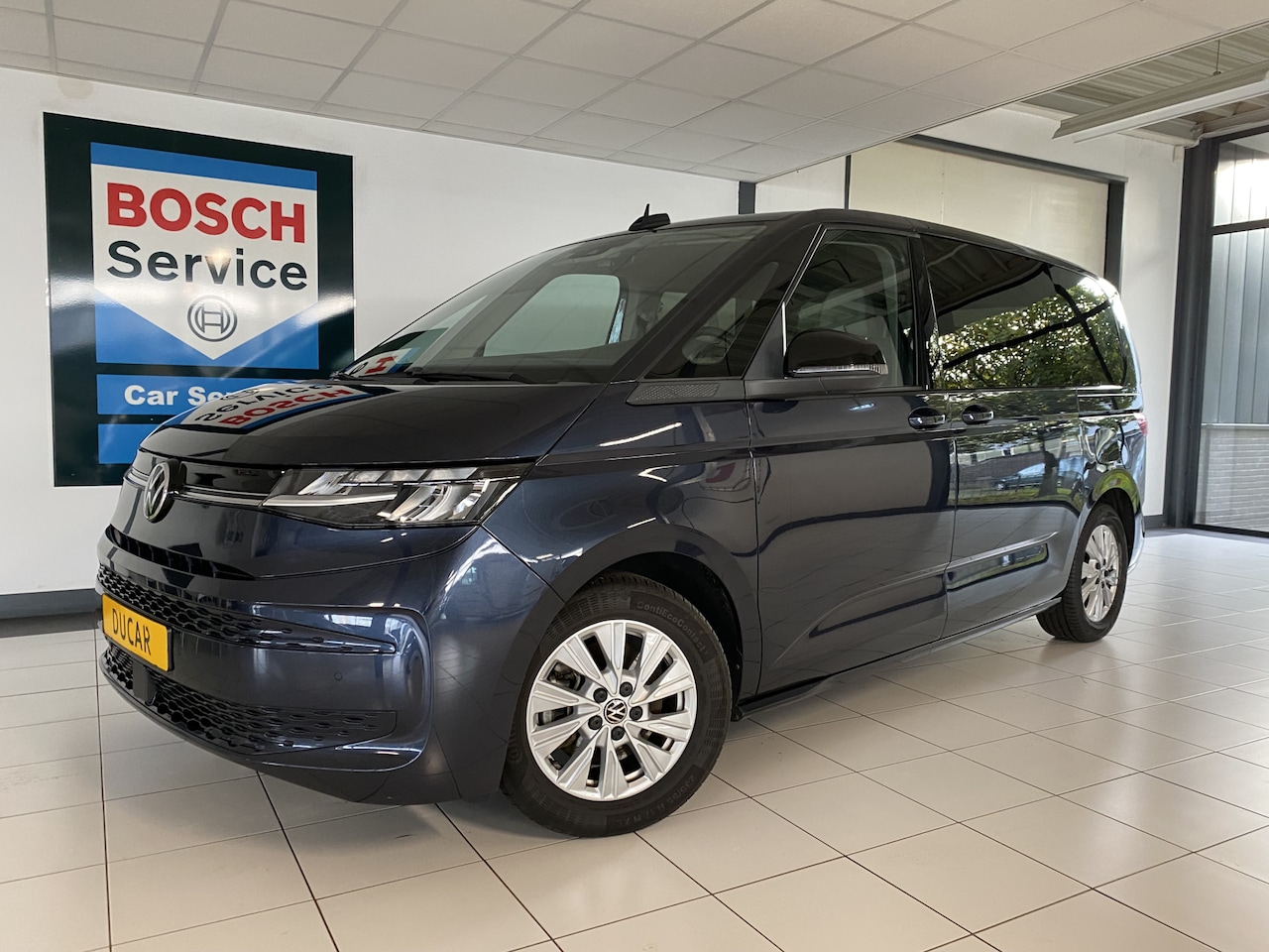Volkswagen Multivan - 1.4 eHybrid L1H1 7 pers Panodak /Elec schuifdeuren / Trekhaak / Camera - AutoWereld.nl