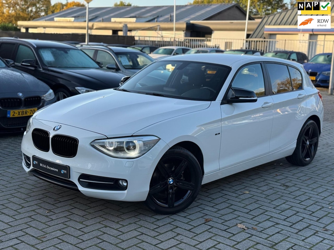 BMW 1-serie - 116i Business Sport|Nieuwe Ketting + Klepseals|Automaat|Climate control|Navigatie|Cruise c - AutoWereld.nl