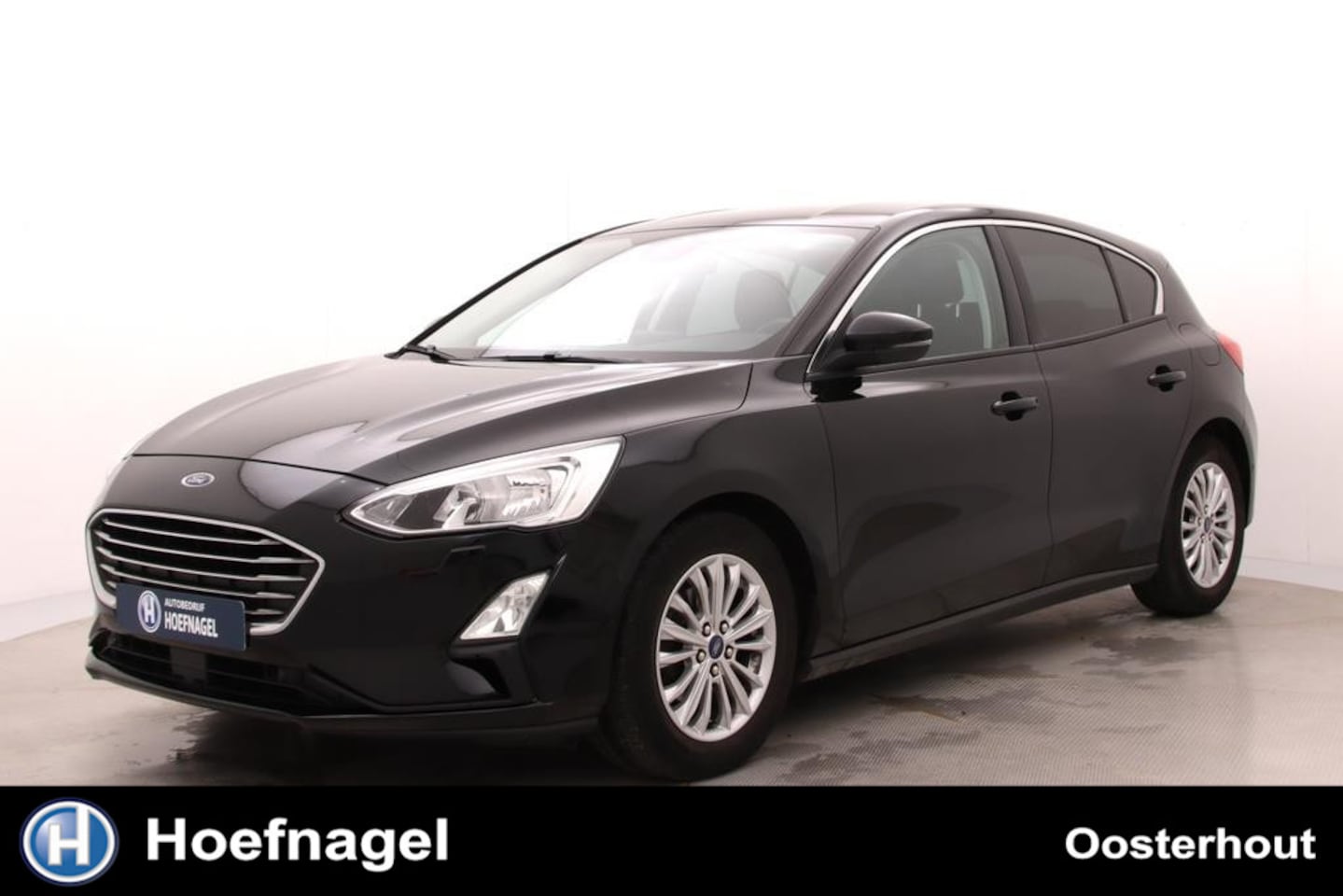 Ford Focus - 1.0 EcoBoost Titanium Business Automaat | Trekhaak | Adaptive Cruise Control | Camera | Pa - AutoWereld.nl