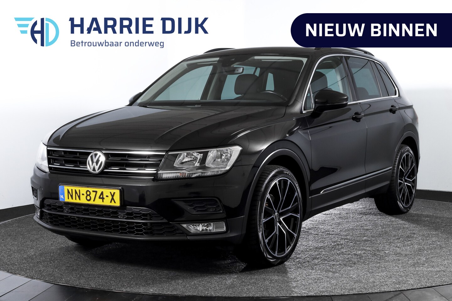 Volkswagen Tiguan - 1.4 TSI Comfortline 126 PK | Cruise | PDC | NAV | ECC | LM 20" | - AutoWereld.nl