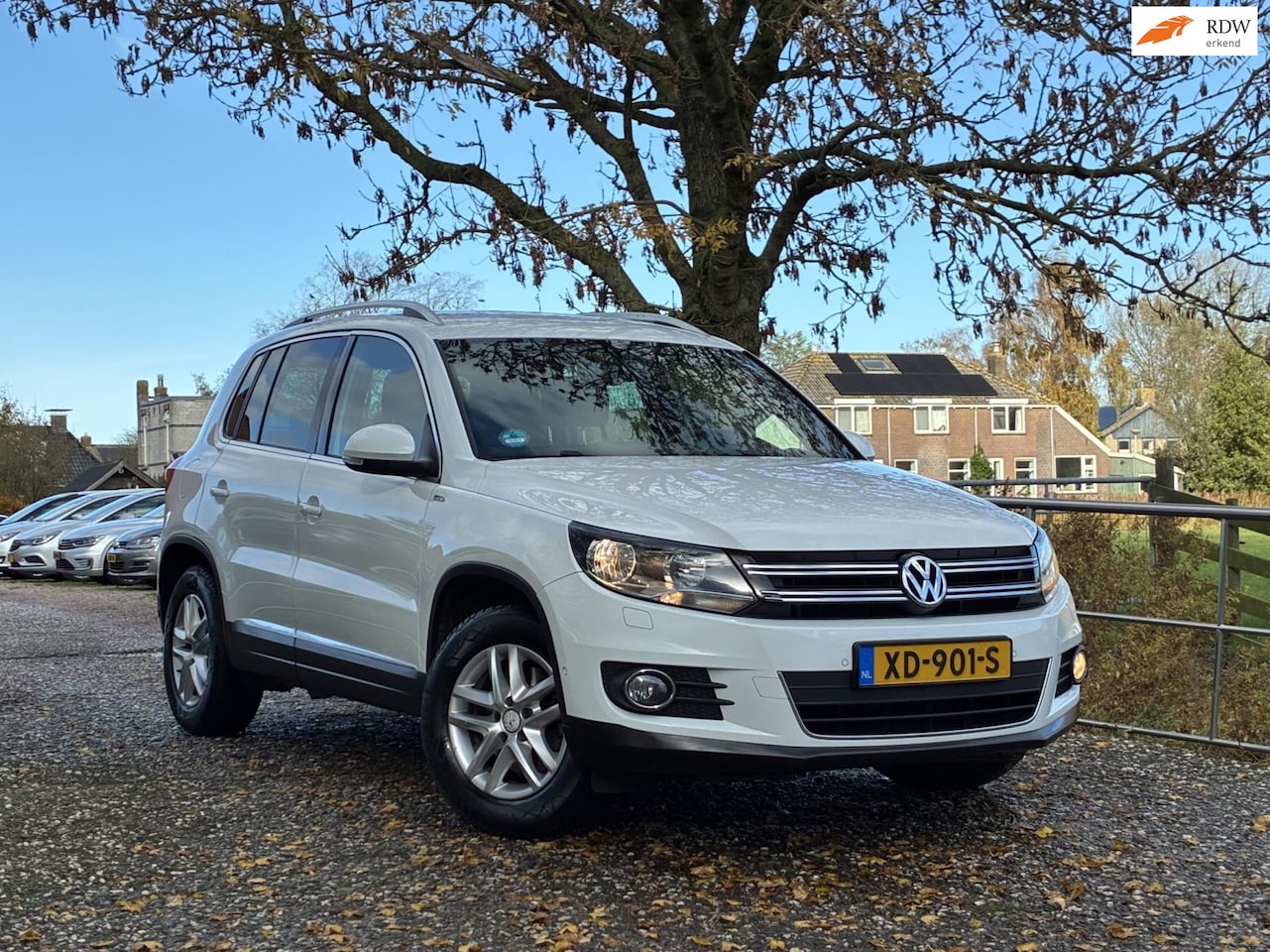 Volkswagen Tiguan - 1.4 TSI | Navi + Clima + PDC + Parkassist nu €8.975,-!! - AutoWereld.nl