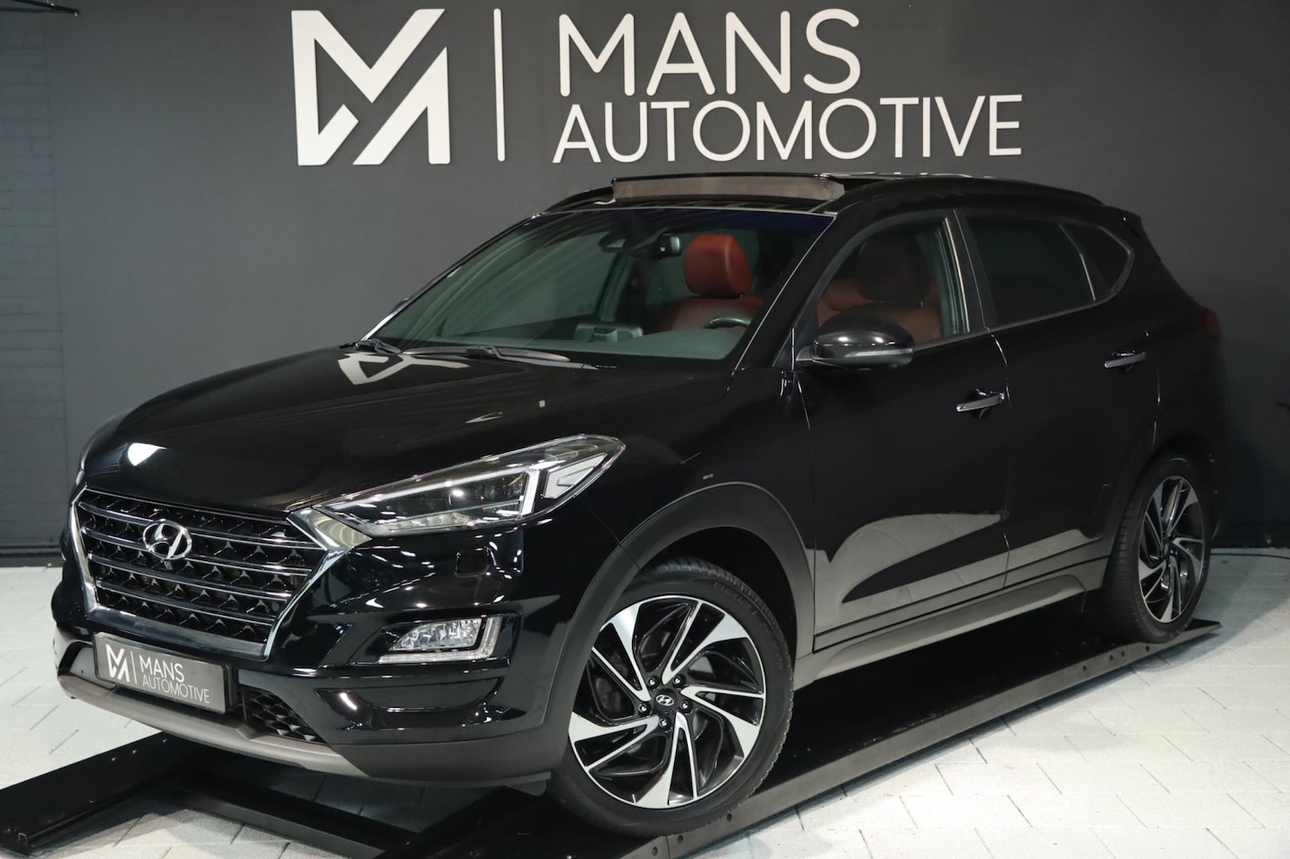 Hyundai Tucson - 1.6 T-GDi Premium 4WD / PANO / LEDER / 360 / VOLLEDIG UITGEVOERD! - AutoWereld.nl