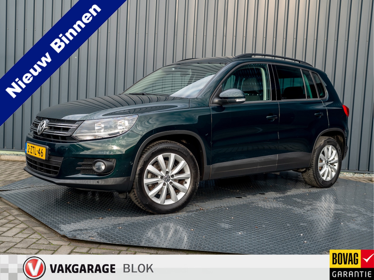 Volkswagen Tiguan - 1.4 TSI Comfort&Design Edition | Navi | Parkeersensoren | Cruise control | Prijs Rijklaar! - AutoWereld.nl