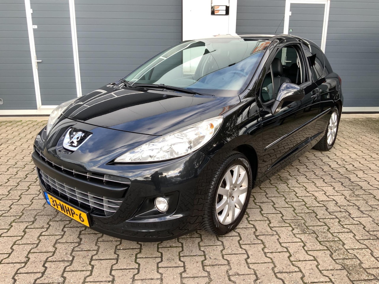 Peugeot 207 - 1.6 VTi Leder PDC Cruise Airco APK 10-2026 - AutoWereld.nl