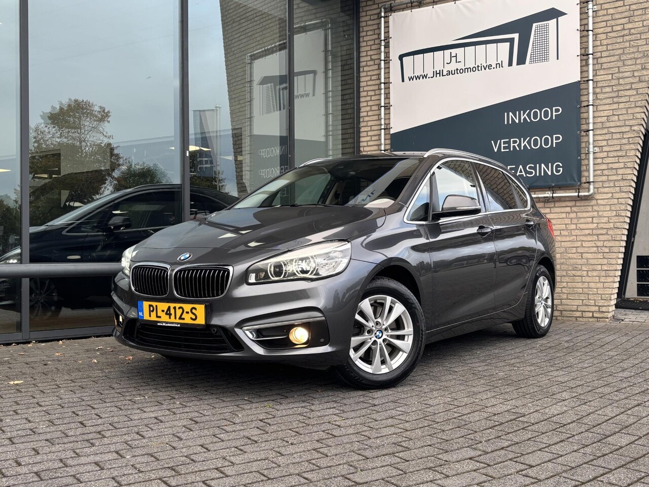 BMW 2-serie Active Tourer - 220i High Executive 220i High Executive - AutoWereld.nl