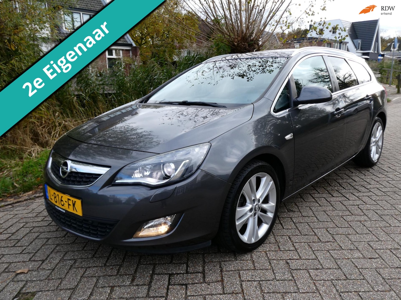 Opel Astra Sports Tourer - 1.4 Turbo Sport 140pk 2e eig. Historie Clima Cruise Navi - AutoWereld.nl