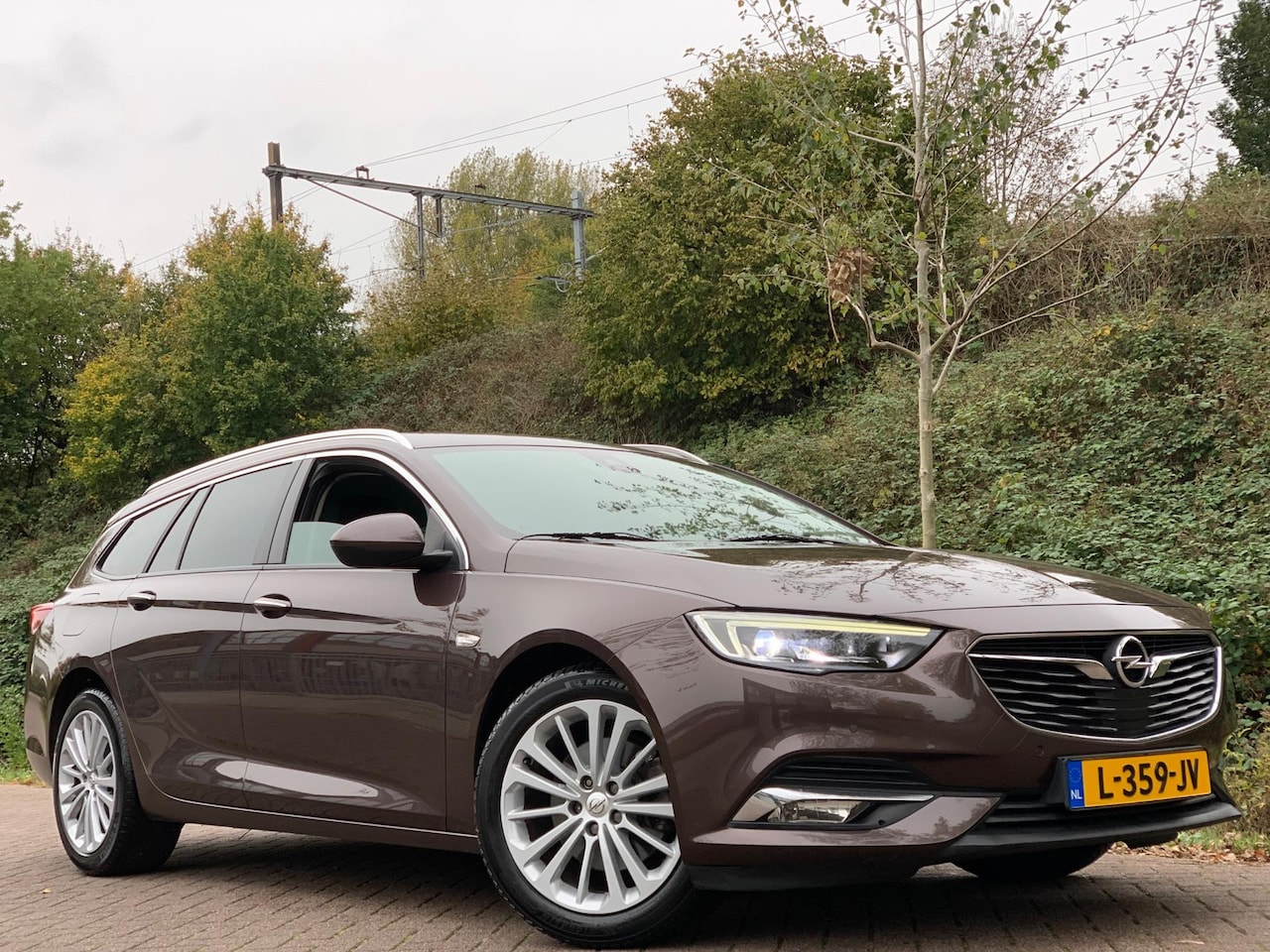 Opel Insignia Sports Tourer - 1.5 Turbo Innovation AUTOMAAT LPG ! - AutoWereld.nl
