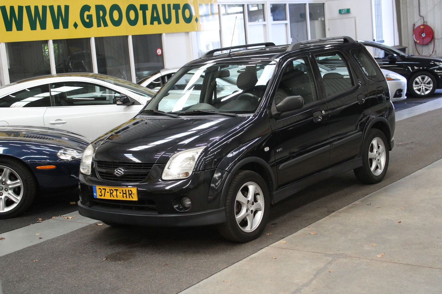 Suzuki Ignis - 1.3-16V FreeStyle Airco, Stuurbekrachtiging - AutoWereld.nl