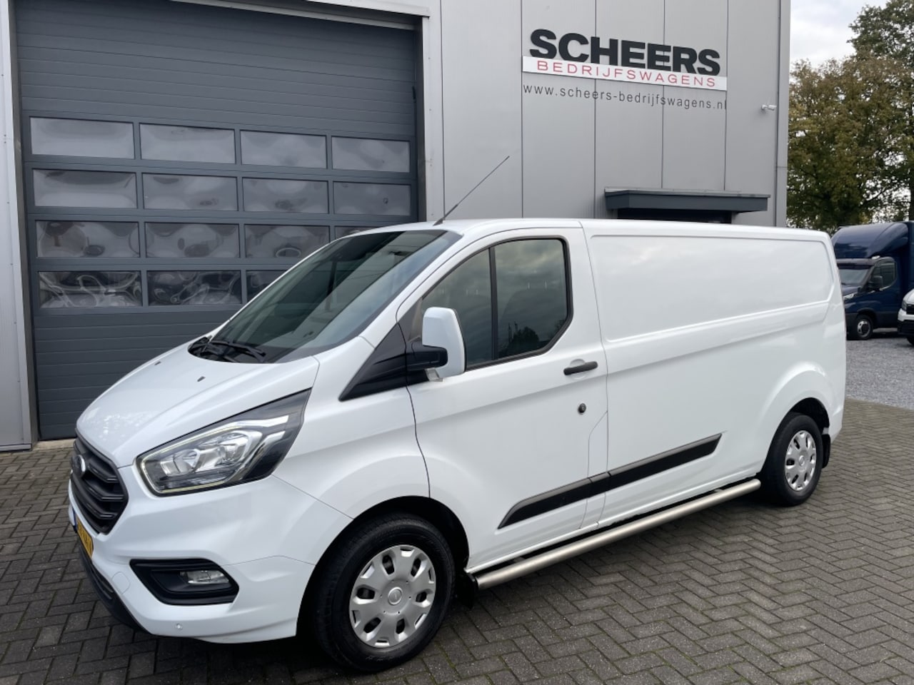 Ford Transit Custom - 2.0 TDCI 130PK L2H1 Trend | airco | camera - AutoWereld.nl