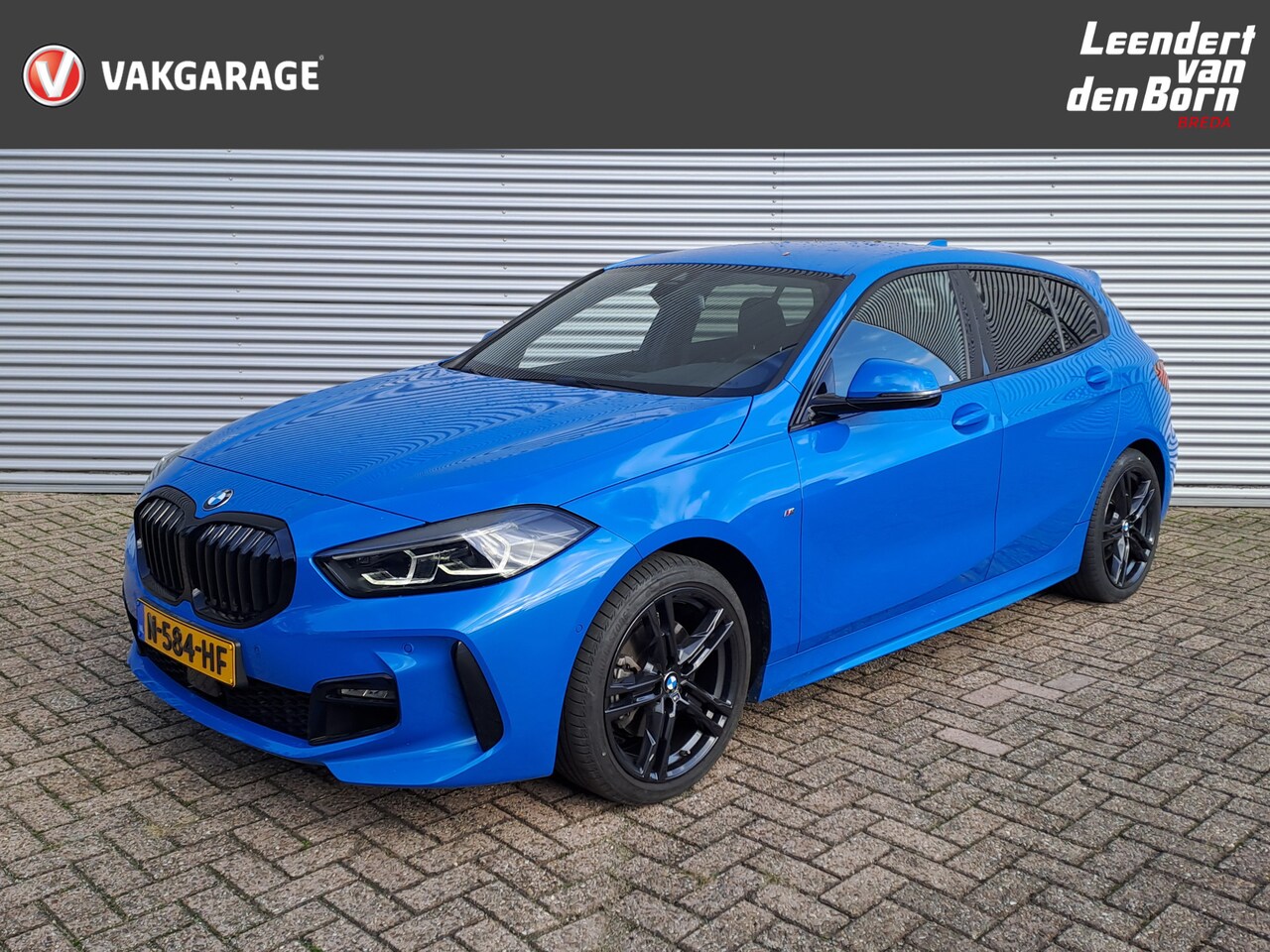 BMW 1-serie - 118i Business Edition AUTOMAAT | M Sport | M stuur leer | Navigatie | Camera | Stoel en St - AutoWereld.nl