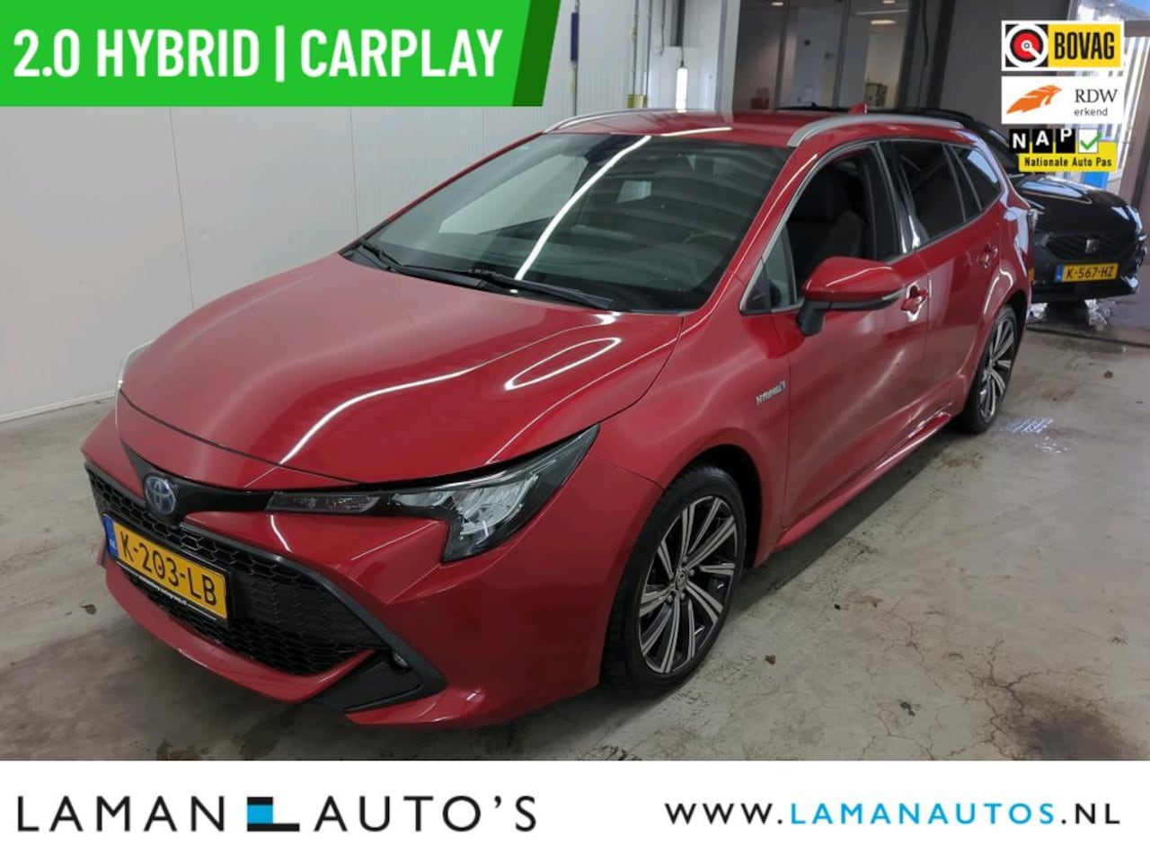 Toyota Corolla Touring Sports - 2.0 Hybrid 184pk Business Plus | CarPlay Halfleder 17" LMV ECC LED ACC Camera Metallic | H - AutoWereld.nl