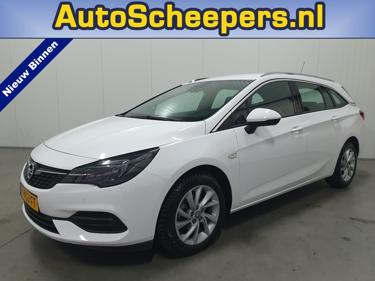 Opel Astra Sports Tourer - 1.2 Elegance NAVI/PDC/CRUISE/CLIMA/LMV - AutoWereld.nl