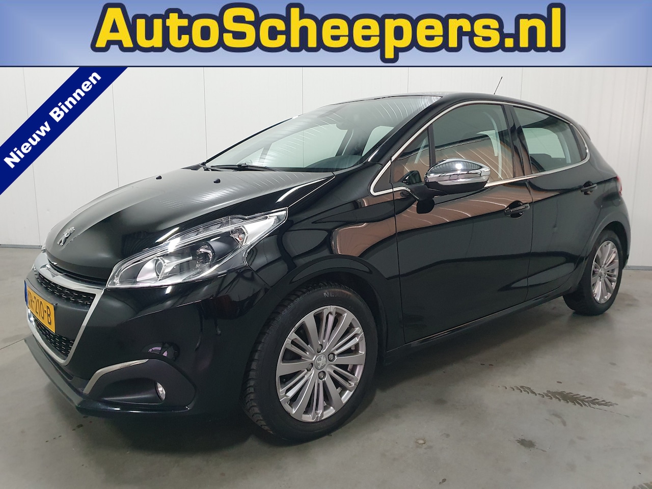 Peugeot 208 - 1.2 PureTech Blue Lease Allure NAVI/CARPLAY/CLIMA/LMV - AutoWereld.nl