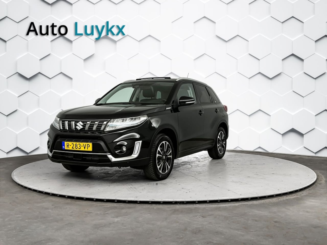 Suzuki Vitara - 1.4 Boosterjet Style Smart Hybrid | Panoramadak | Lederen Bekleding | Adaptieve Cruise Con - AutoWereld.nl