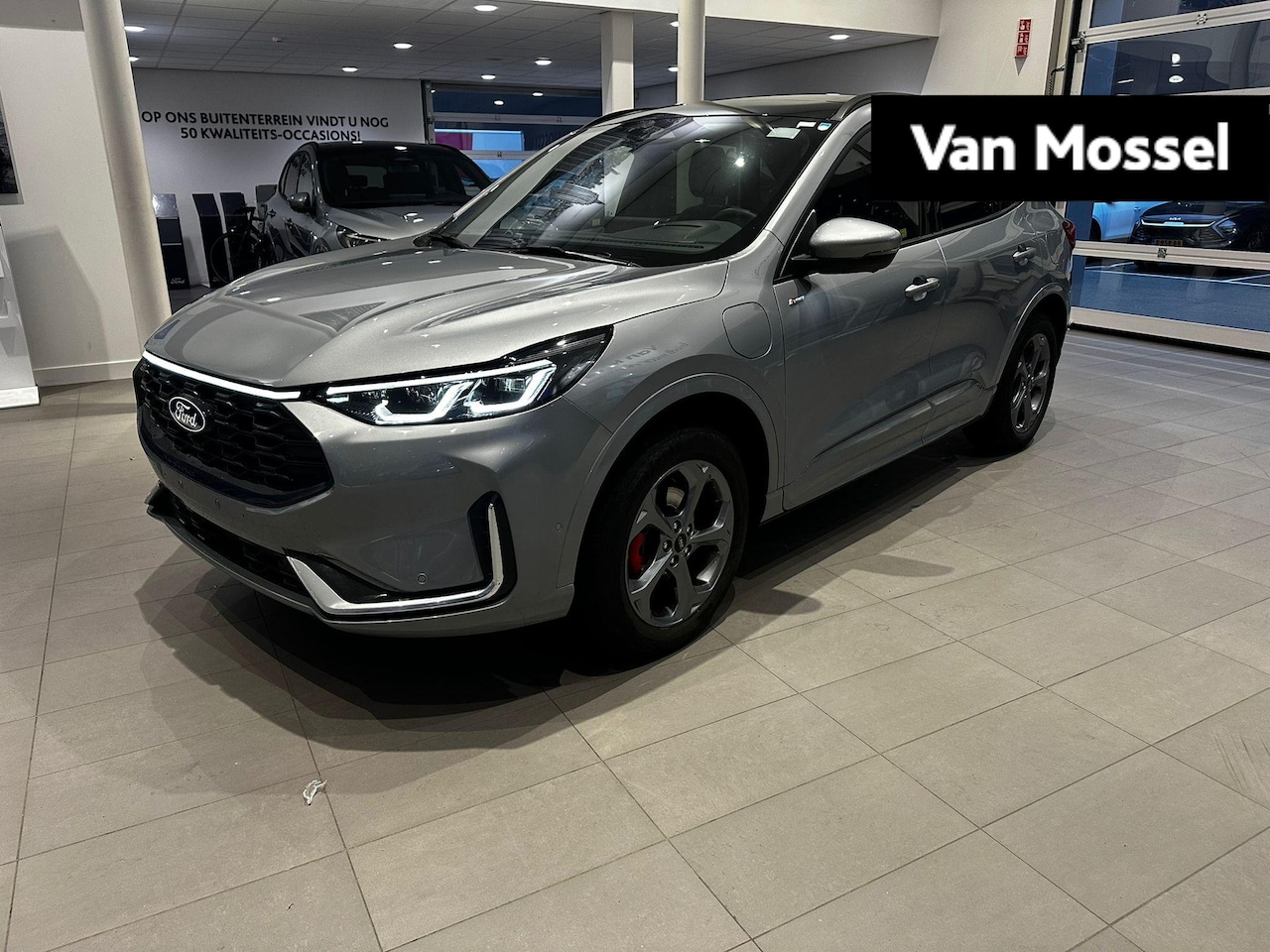 Ford Kuga - 2.5 PHEV ST-Line X | TREKHAAK | STOEL, STUUR EN VOORRUITVERWARMING | NAVIGATIE | PARKEERSE - AutoWereld.nl