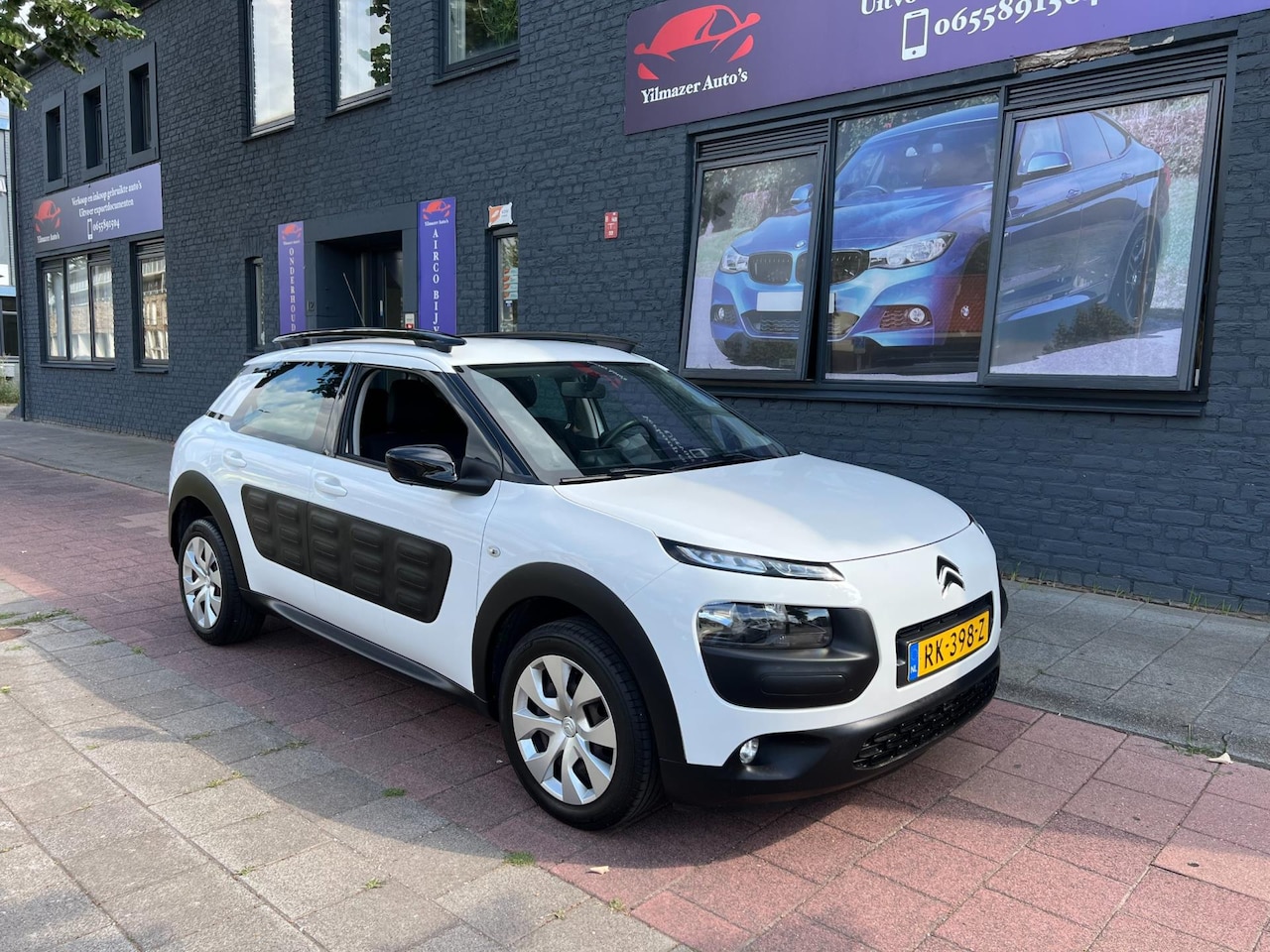 Citroën C4 Cactus - 1.2 PureTech navi riem vervangen - AutoWereld.nl