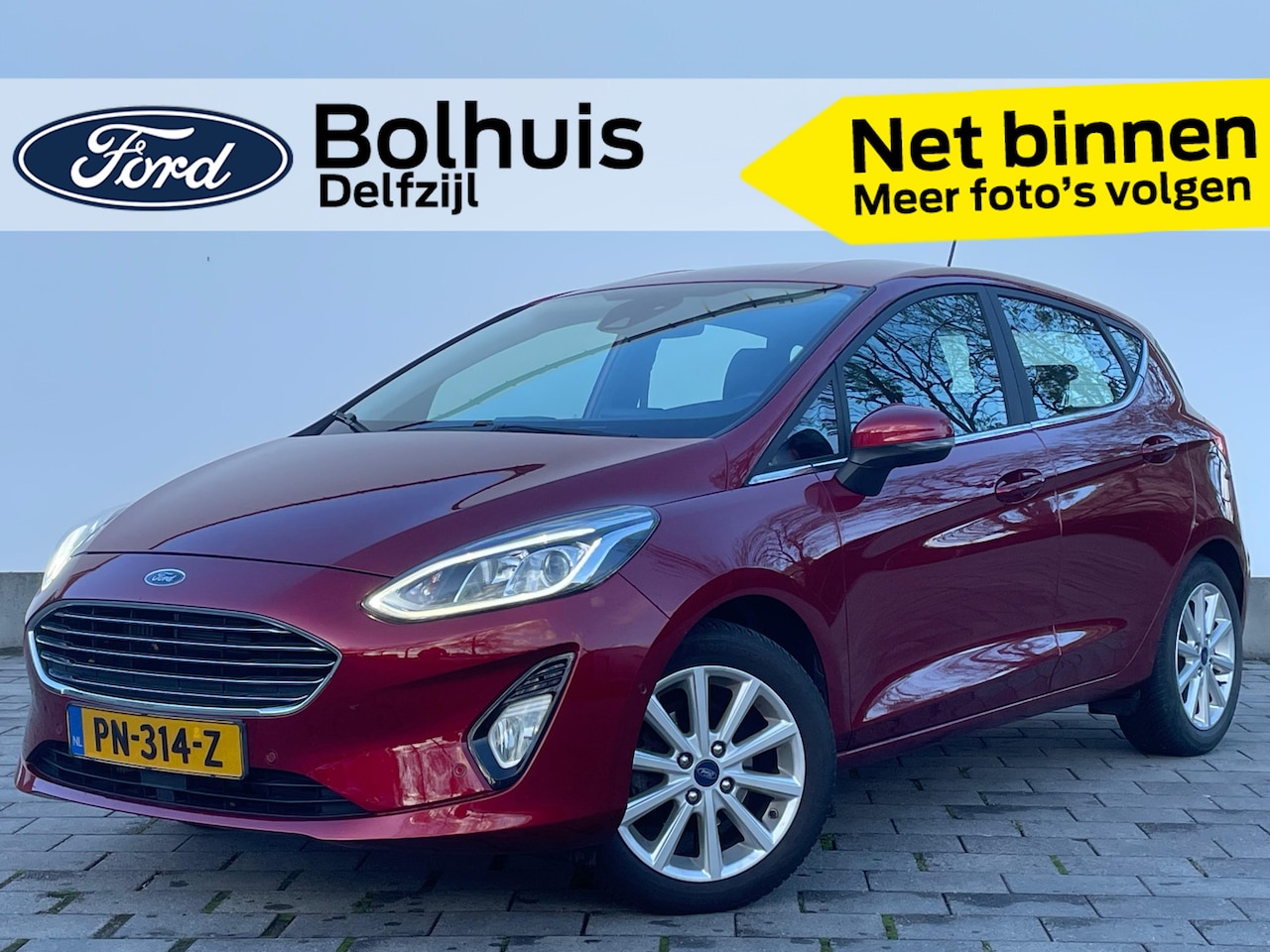 Ford Fiesta - EcoBoost Titanium | Adapt. Cruise | Trekhaak | Climate control | Camera | Verwarmde voorru - AutoWereld.nl