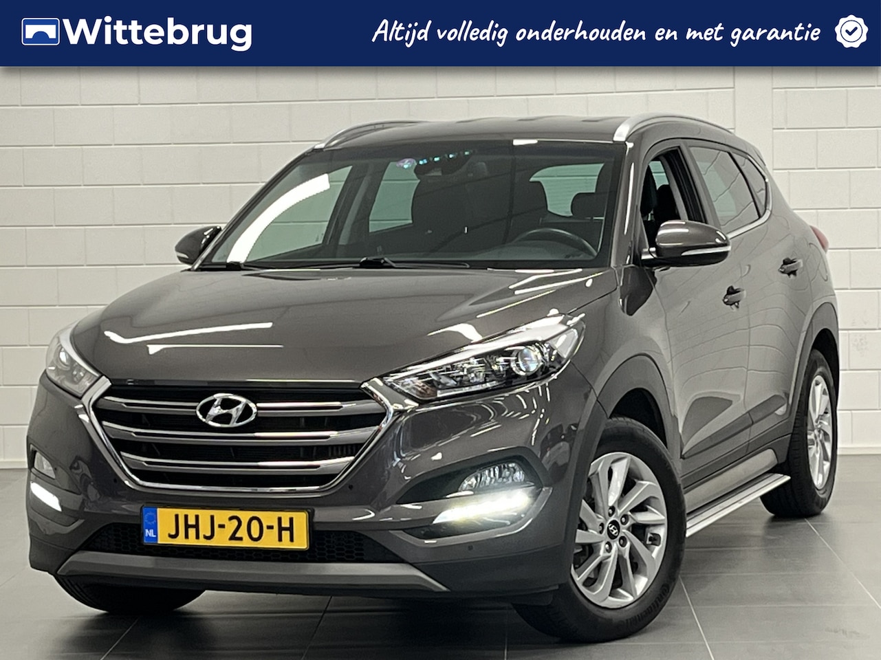 Hyundai Tucson - 1.6 T-GDi Comfort NAVIGATIE | SIDE BARS | VOLLEDIG DEALER ONDERHOUDEN!! - AutoWereld.nl