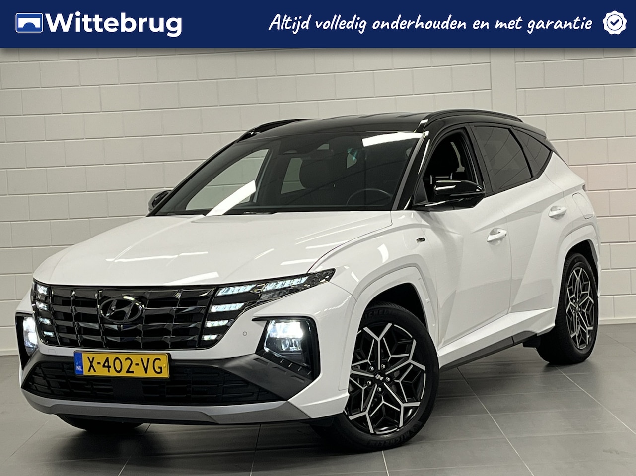 Hyundai Tucson - 1.6 T-GDI PHEV N Line 4WD TREKHAAK | TWO TONE | NAVIGATIE | PARKEERCAMERA | SPORTIEF! - AutoWereld.nl