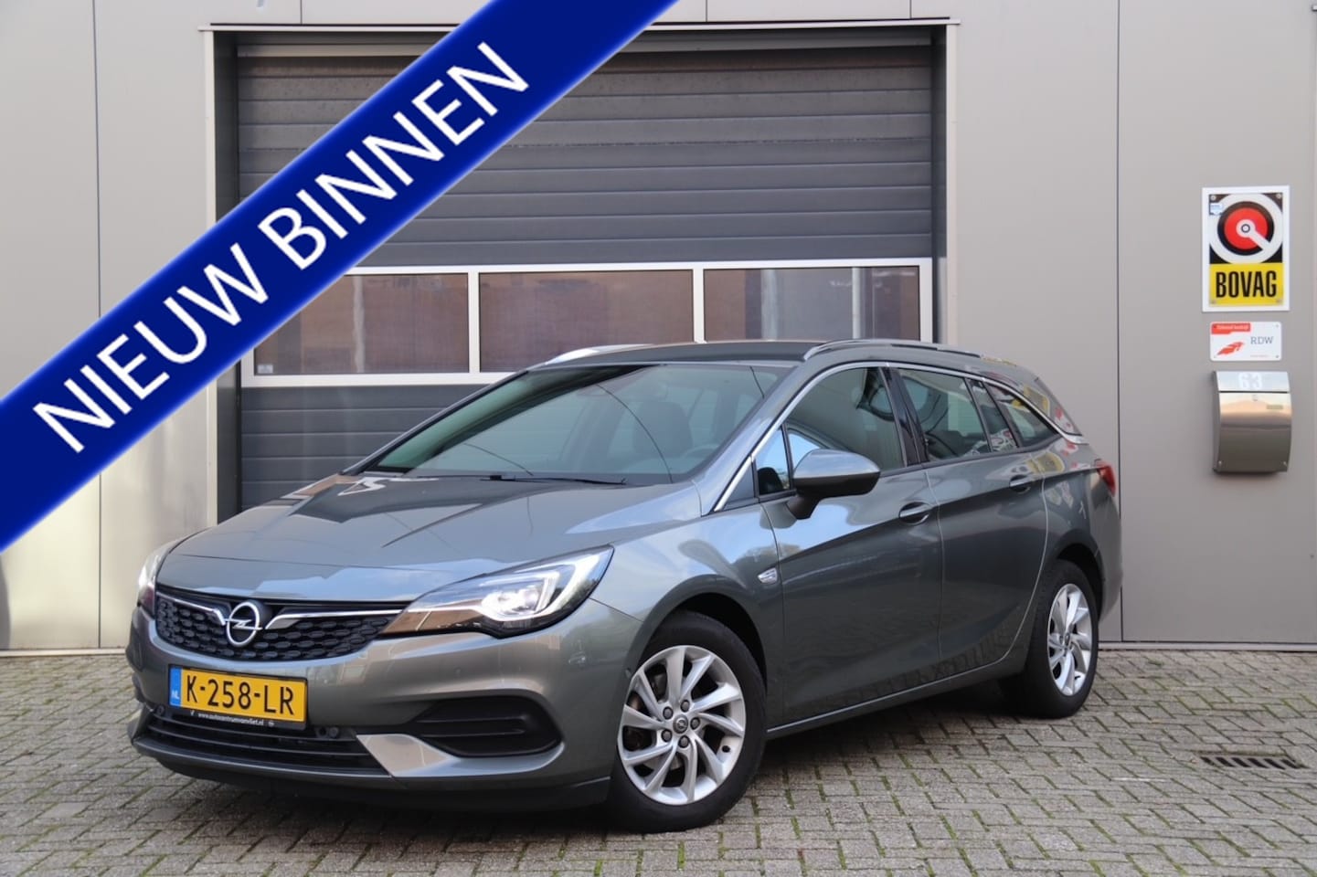 Opel Astra Sports Tourer - 1.4 Elegance Automaat, Stoel & Stuurverwarmd/Verkoeling, leder, Camera - AutoWereld.nl
