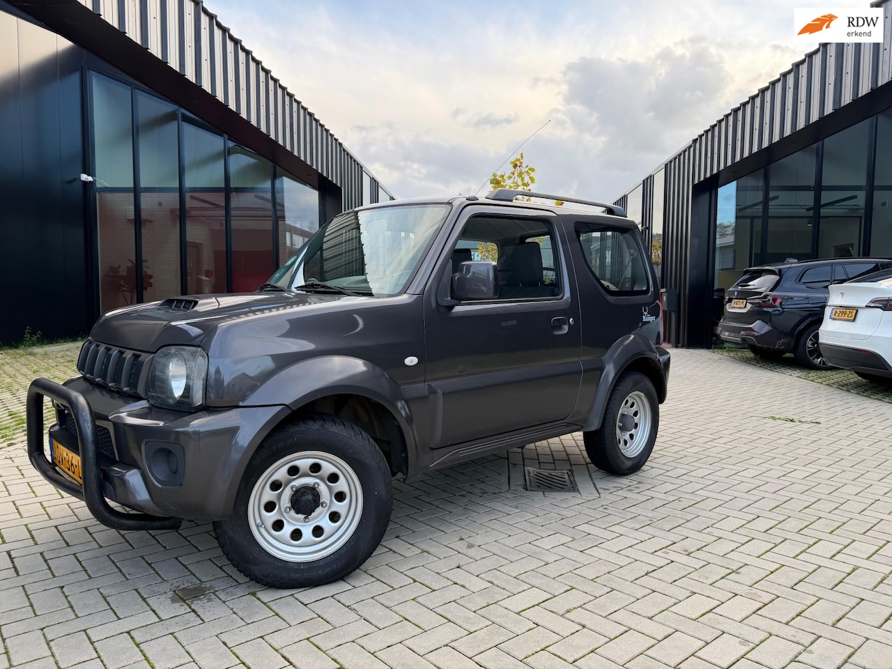 Suzuki Jimny - 1.3 Exclusive Airco Stoelvw 4WD - AutoWereld.nl