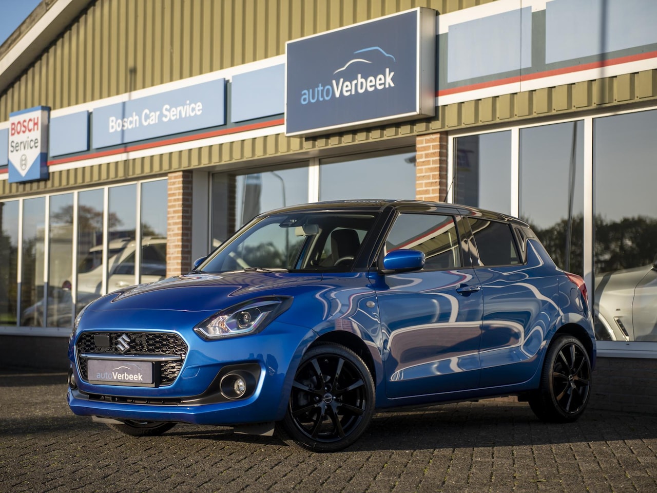 Suzuki Swift - 1.2 Select Smart Hybrid | Sportstoelen | Black Optic | Navi & Apple Carplay/Android Auto | - AutoWereld.nl