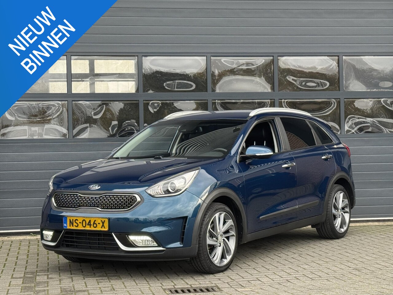 Kia Niro - 1.6 GDI HYBRID FIRST EDITION I AUTOMAAT I TREKHAAK I APPLE CARPLAY I ACHTERUITRIJCAMERA - AutoWereld.nl