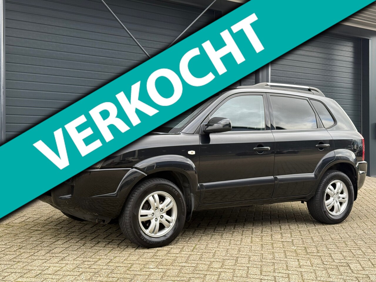 Hyundai Tucson - 2.0i Style 2.0i Style, Climate control, Nieuwe APK - AutoWereld.nl