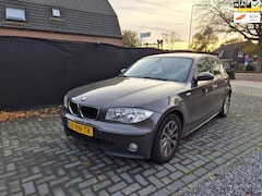 BMW 1-serie - 118i Automaat 5 Drs Airco loopt soms niet lekker