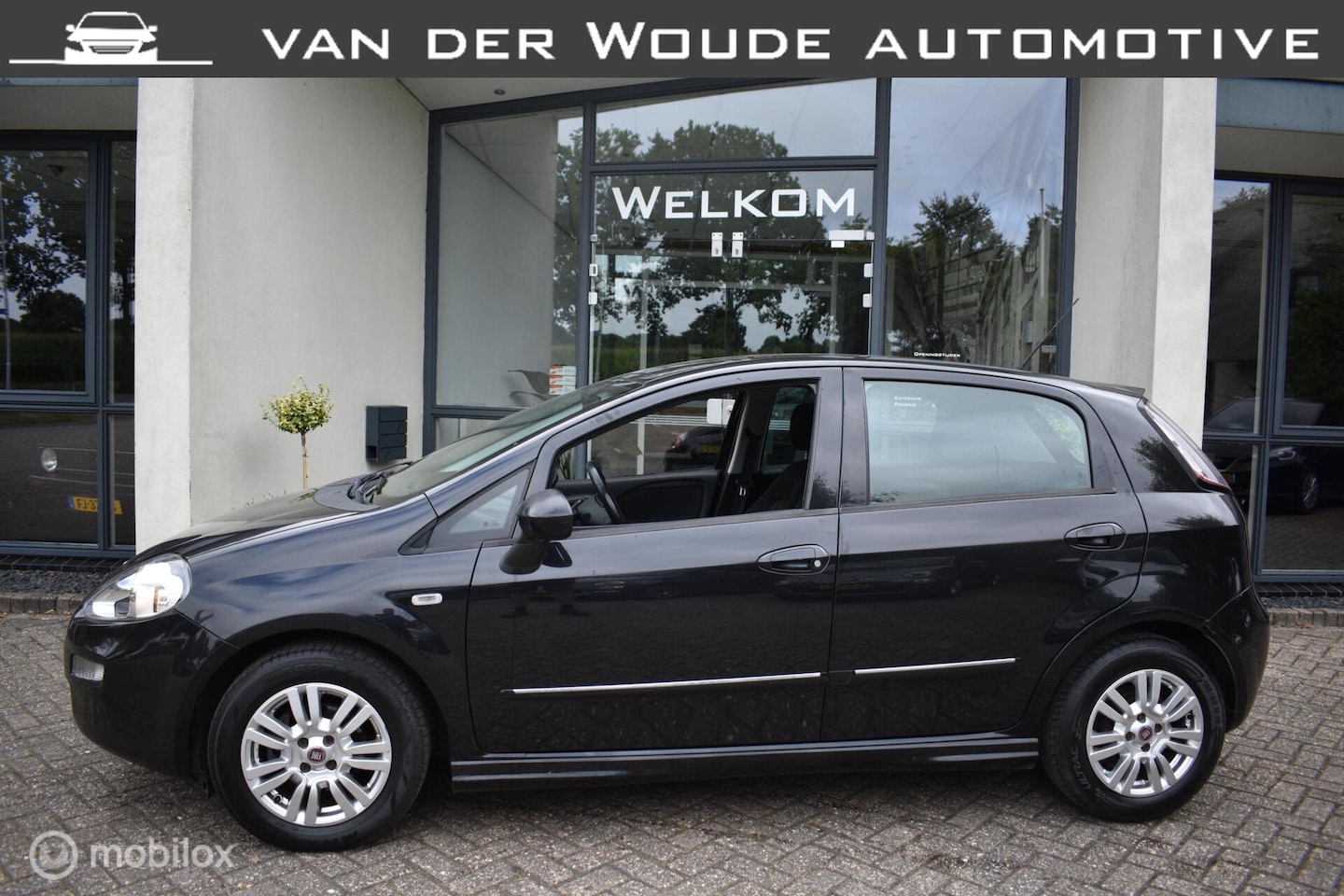 Fiat Punto Evo - 1.3 M-Jet Street 1.3 M-Jet Street 5DRS, 2014 Airco|Cruise! - AutoWereld.nl