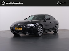 BMW i4 - M50 High Executive 84 kWh | SOH 98% | M-Sport | Schuif/Kantel dak | Sportstoelen | Harman/