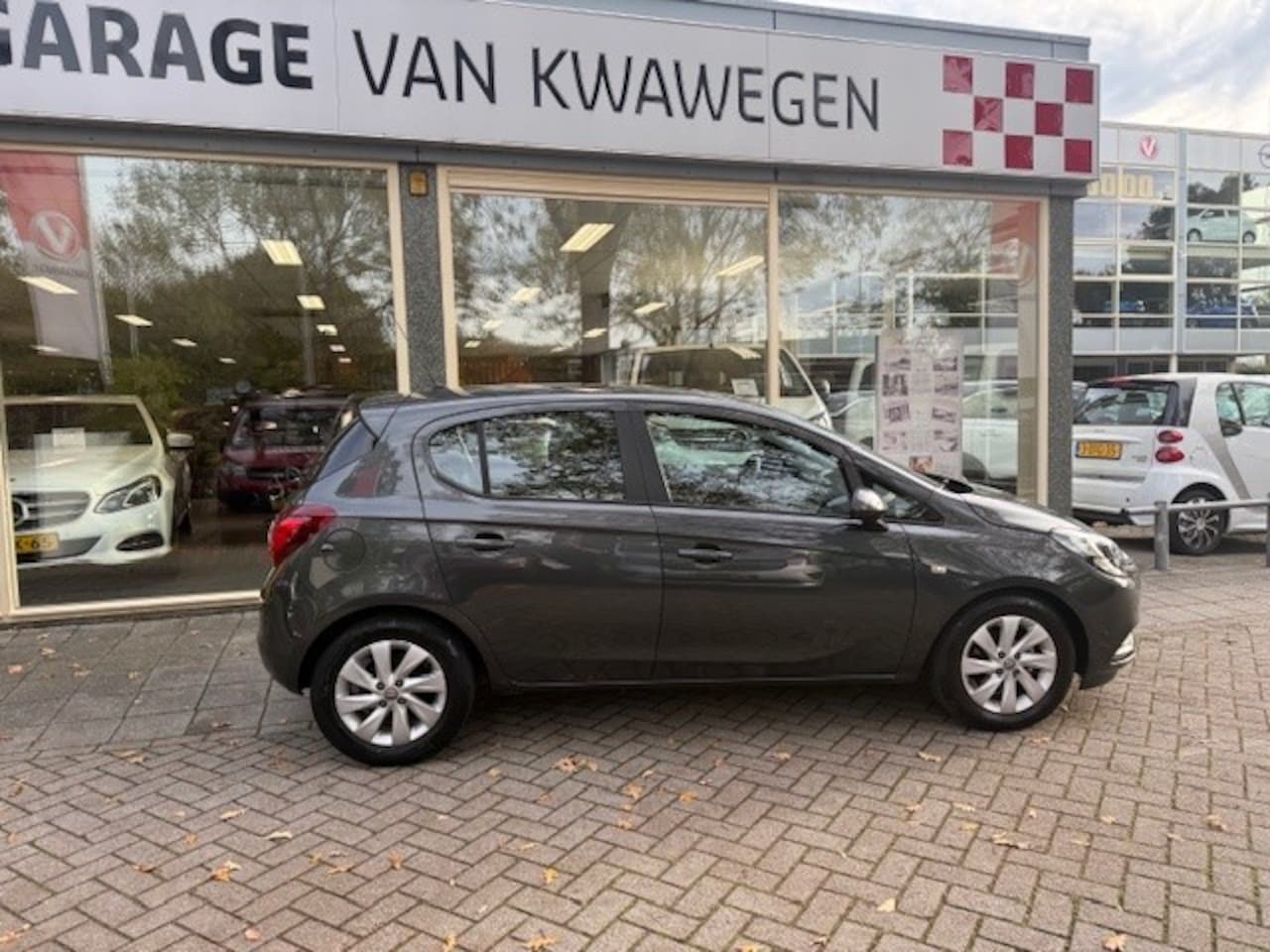 Opel Corsa - 1.2 EDITION AIRCO L.M. VELGEN BLUETOOTH - AutoWereld.nl