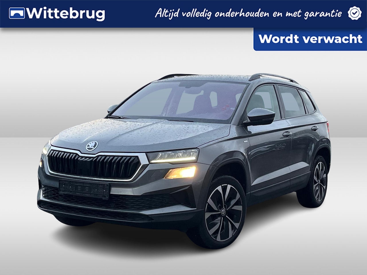 Skoda Karoq - 1.5 TSI ACT 150pk Ambition DSG Automaat / Navigatie / Panorama dak / LM 18 inch / Parkeers - AutoWereld.nl