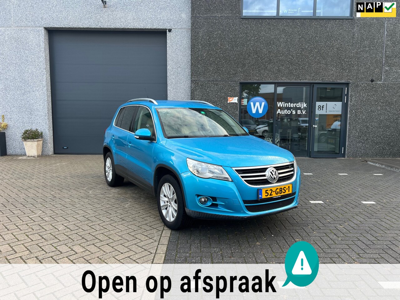 Volkswagen Tiguan - 2.0 TSI Sport&Style 4Motion Trekhaak Automaat - AutoWereld.nl