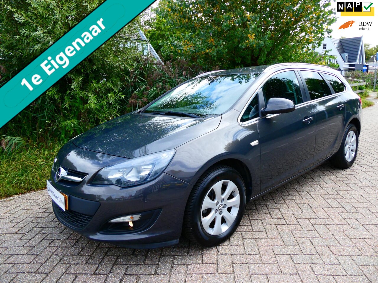 Opel Astra Sports Tourer - 1.4 Turbo 120pk Airco Cruise Navi PDC 1e eigenaar - AutoWereld.nl