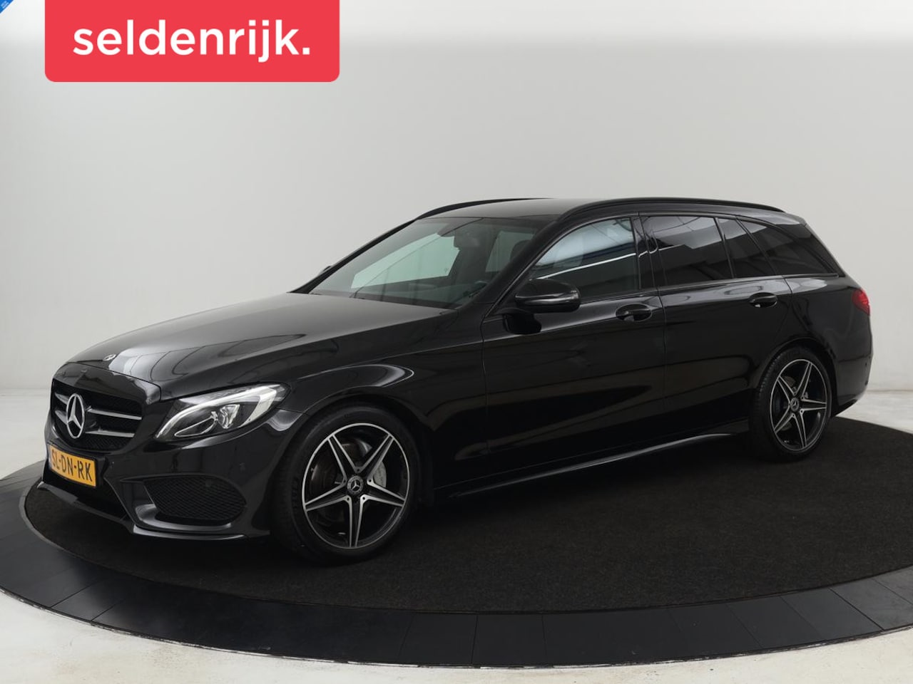 Mercedes-Benz C-klasse - 200 AMG Night | Leder | Stoelverwarming | Full LED | Park Assist | Navigatie | Climate con - AutoWereld.nl