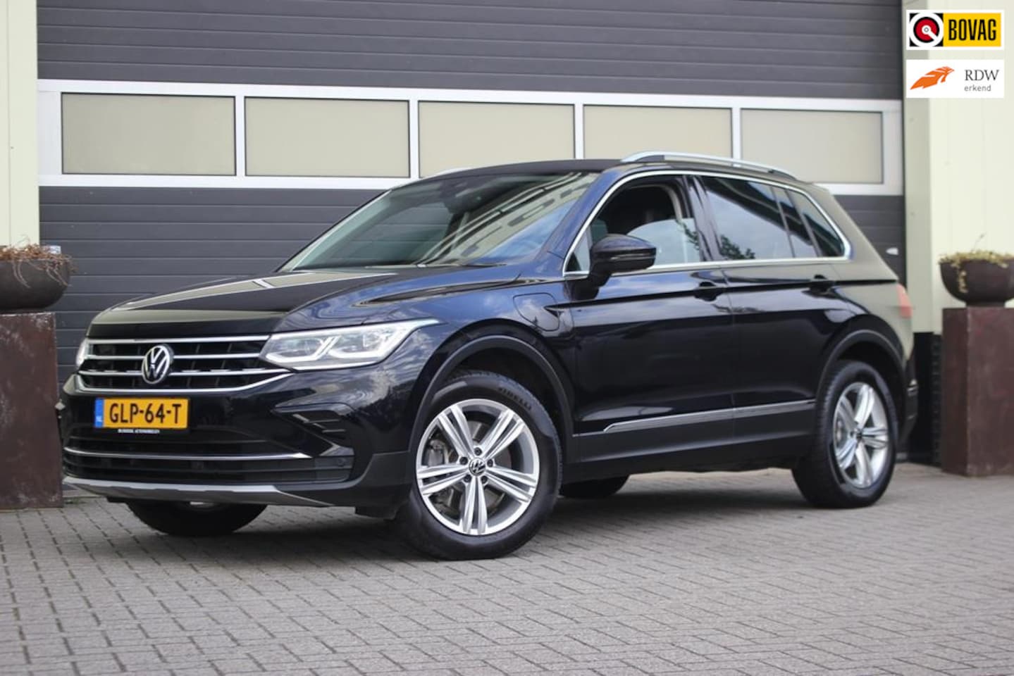 Volkswagen Tiguan - 1.4 TSI eHybrid Business+ | Trekhaak | Leer - AutoWereld.nl
