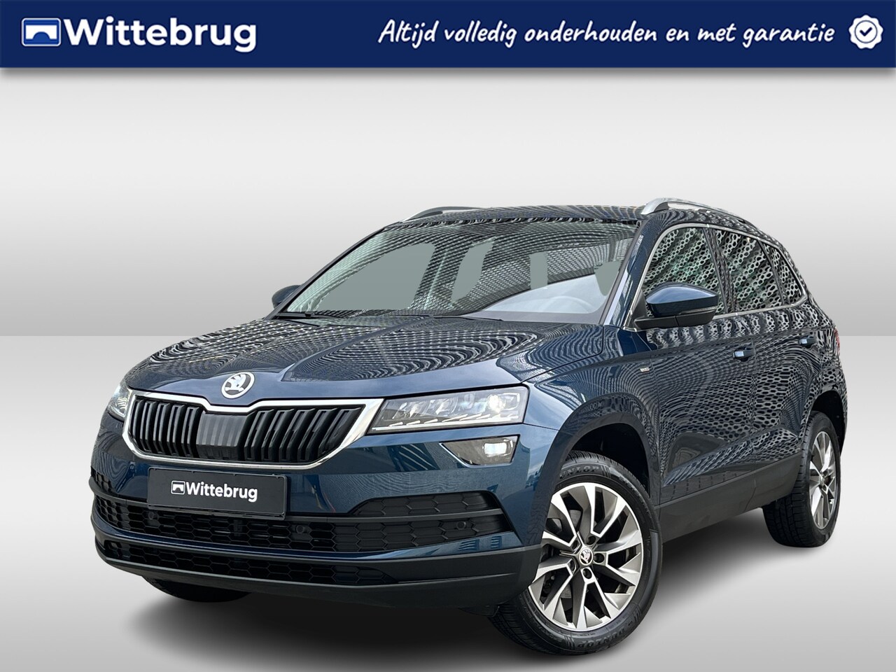 Skoda Karoq - 1.0 TSI 110PK Ambition / Travel Assist / Led / Achteruitrijcamera / Stoelverwarming V+A  / - AutoWereld.nl