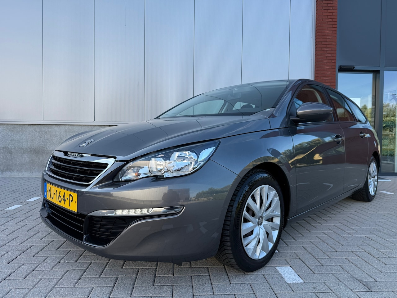 Peugeot 308 SW - 1.6 BlueHDI Blue Lease Executive|Navi|Cruise|Pdc|Nap - AutoWereld.nl