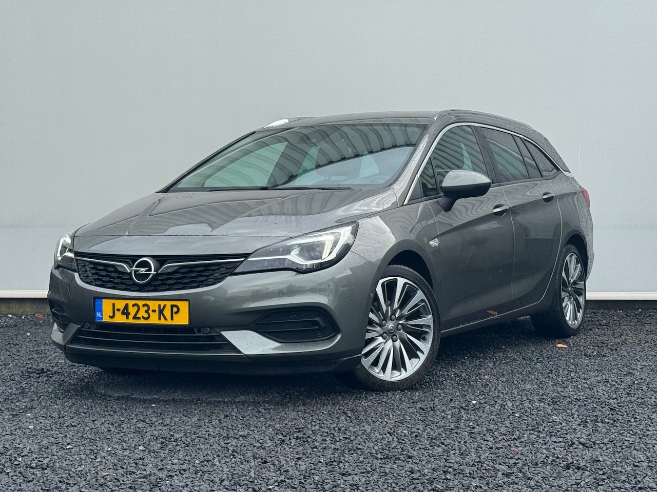 Opel Astra Sports Tourer - 1.2 Elegance | Achteruitrijcamera | Climate Controle | Verwarmd Leder Stuur & Comfort Sto - AutoWereld.nl