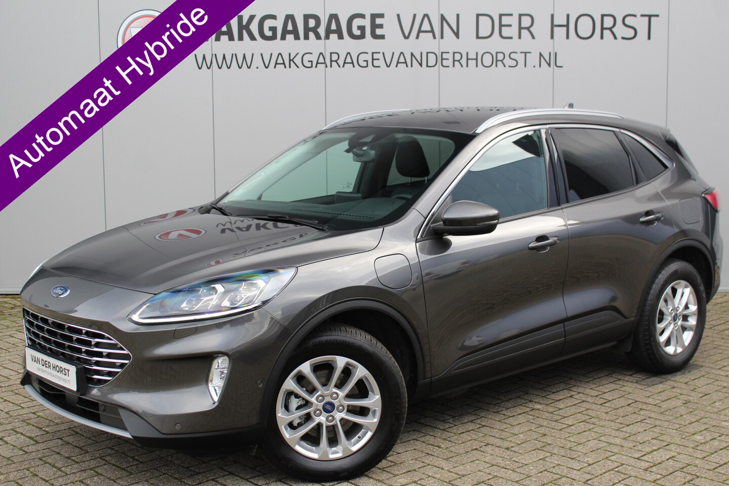 Ford Kuga - 2.5-225pk PHEV Titanium X. Hybride rijden voor een reële prijs ! Stoel-, stuur- en voorraa - AutoWereld.nl