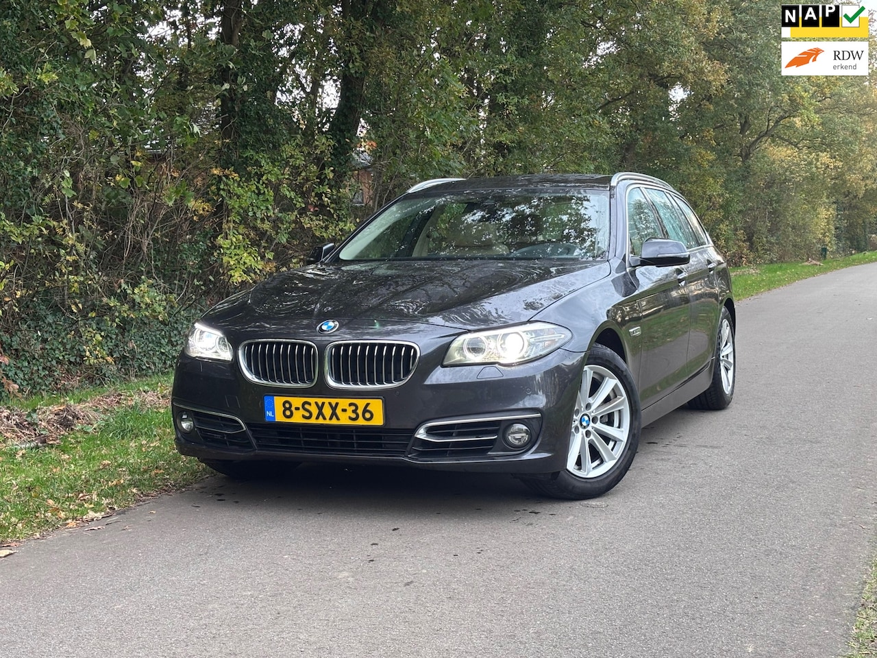 BMW 5-serie Touring - 520i High Luxury Edition | Cruise + Navi Nu € 13.950,-!!! - AutoWereld.nl