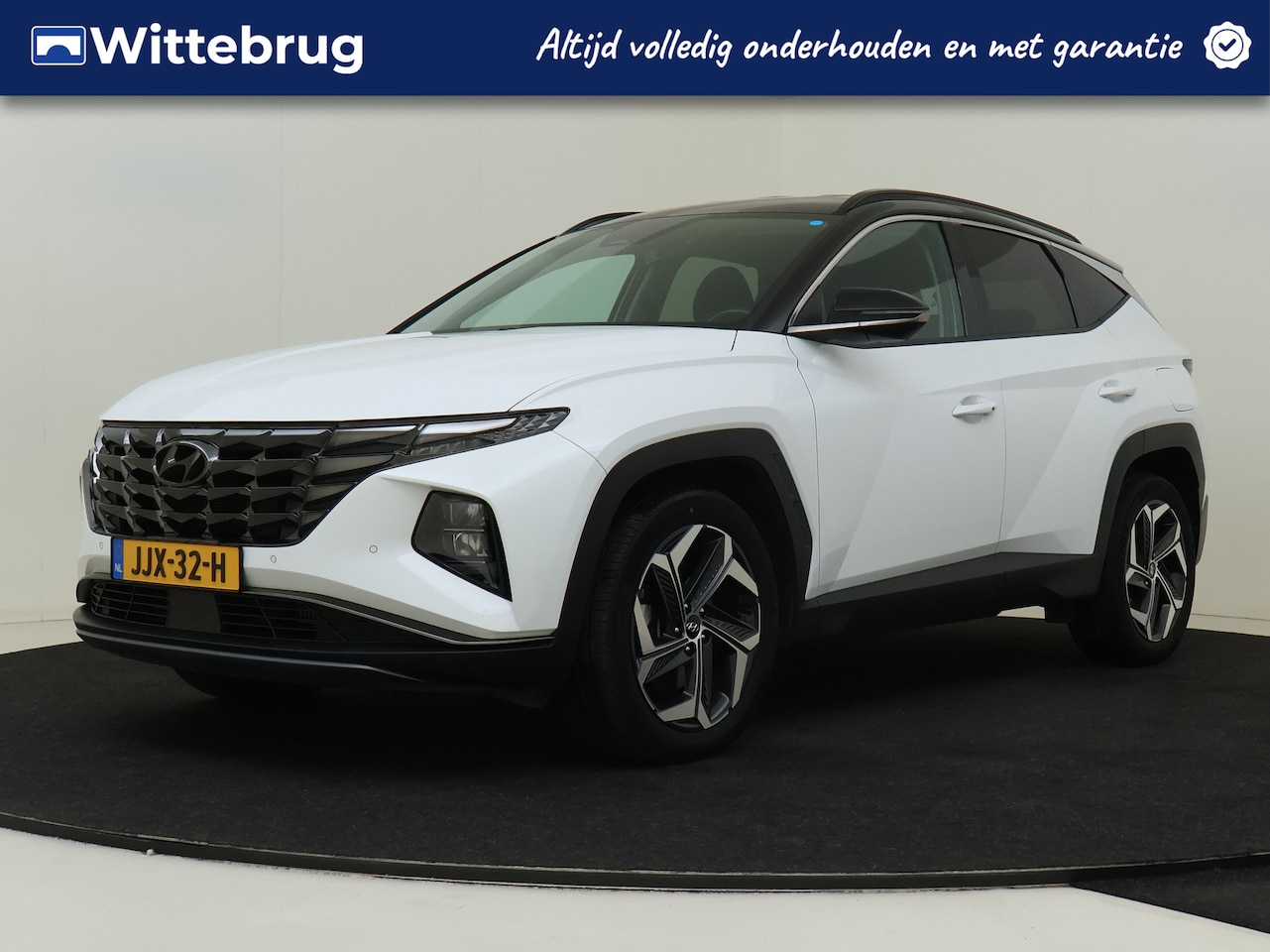 Hyundai Tucson - 1.6 T-GDI HEV Comfort Smart TWO TONE | 19 INCH VELGEN | AUTOMATISCHE ACHTERKLEP - AutoWereld.nl