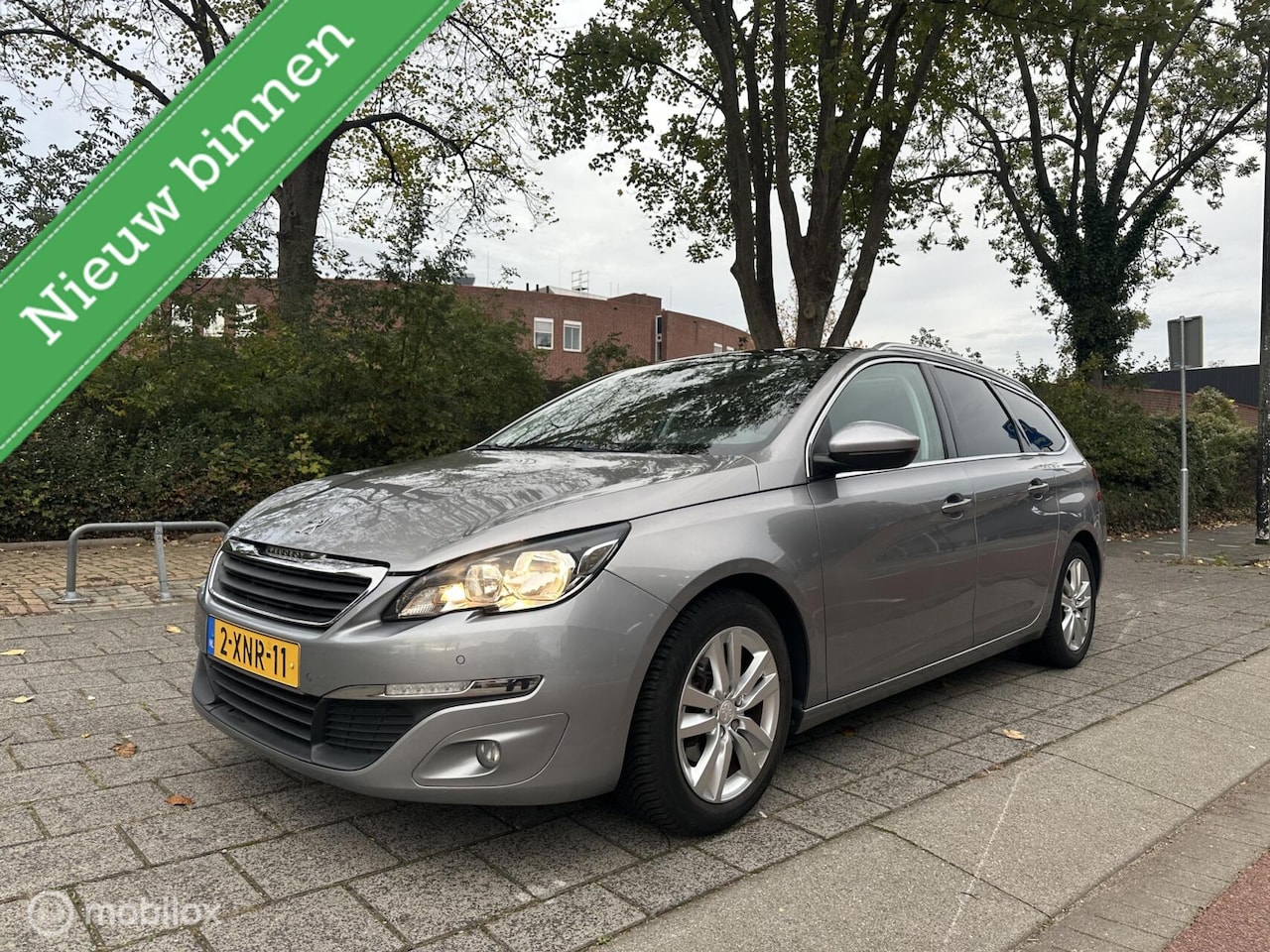 Peugeot 308 SW - 1.6 BlueHDI Blue Lease Exec ECC/NAVI/PANO/PDC - AutoWereld.nl